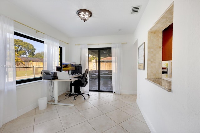 home office featuring light tile patterned floors