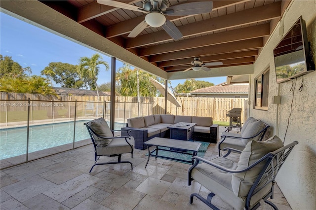 view of patio / terrace with a fenced in pool, outdoor lounge area, and ceiling fan