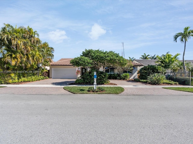 view of front of home with a garage