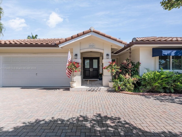 view of front of property featuring a garage