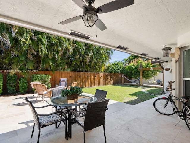 view of patio / terrace with ceiling fan