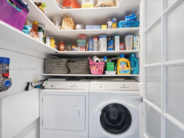 laundry room with washer and clothes dryer