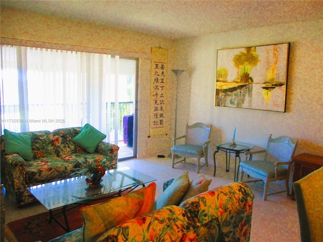 living room featuring a textured ceiling