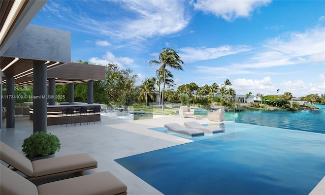 view of swimming pool with a water view, outdoor lounge area, and a patio