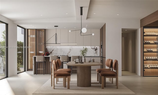 dining room with floor to ceiling windows