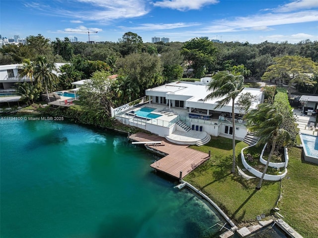 drone / aerial view with a water view