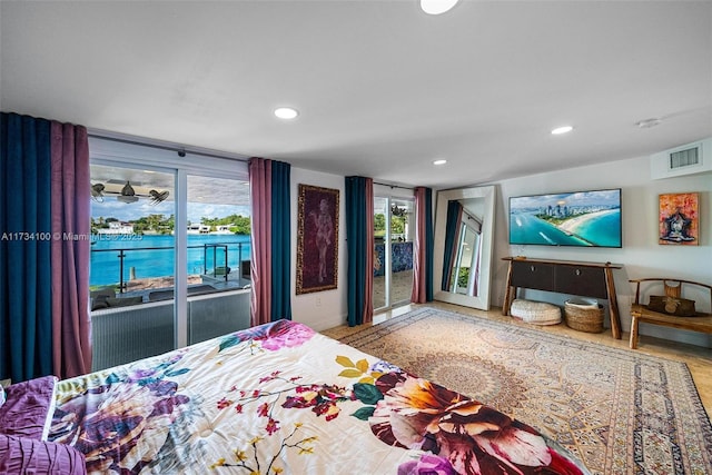 2091 NE 191st Dr, North Miami Beach, FL 33179 - bedroom with recessed lighting, visible vents, multiple windows, and access to outside