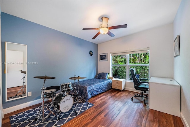 bedroom with ceiling fan and hardwood / wood-style floors