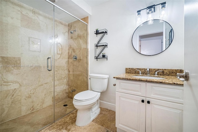 2091 NE 191st Dr, North Miami Beach, FL 33179 - full bathroom featuring tile patterned floors, toilet, a stall shower, baseboards, and vanity