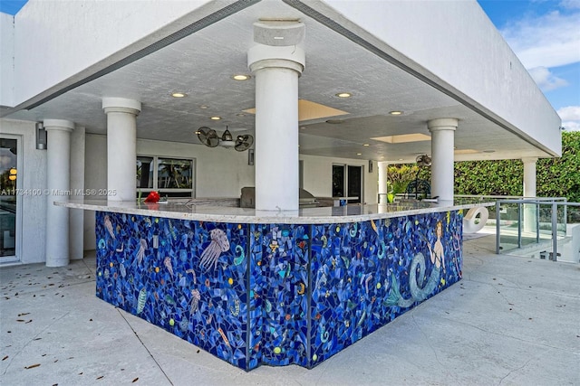 view of patio / terrace with an outdoor bar