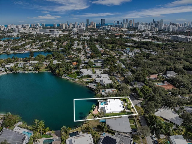 drone / aerial view with a water view