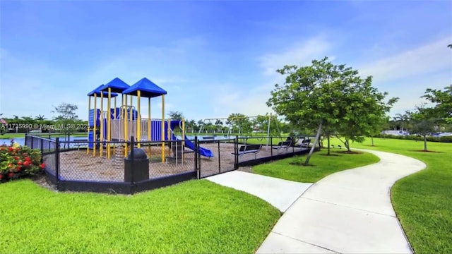 community play area with a lawn