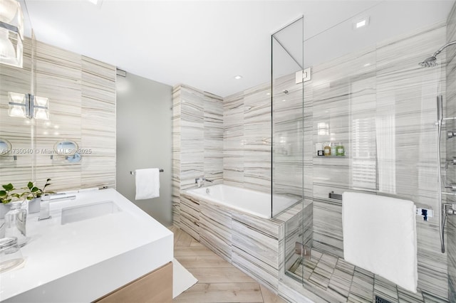 2201 Collins Ave Unit 1128, Miami Beach, FL 33139 - full bath with a garden tub, vanity, and a shower stall