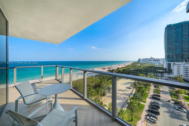 2201 Collins Ave Unit 1128, Miami Beach, FL 33139 - balcony featuring view of water and beach and a view of city