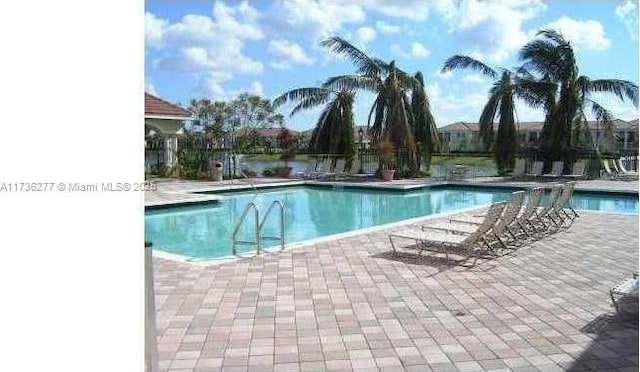 view of pool with a patio area