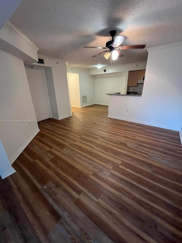 2494 Centergate Dr Unit 103, Miramar, FL 33025 - unfurnished living room with crown molding, baseboards, a textured ceiling, a ceiling fan, and wood finished floors