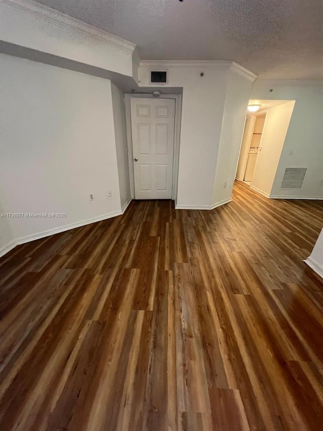 2494 Centergate Dr Unit 103, Miramar, FL 33025 - interior space featuring visible vents, crown molding, and a textured ceiling