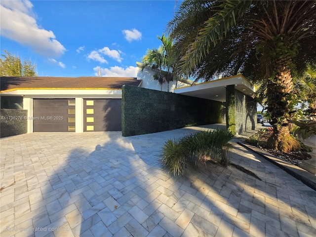 view of front of home featuring a garage