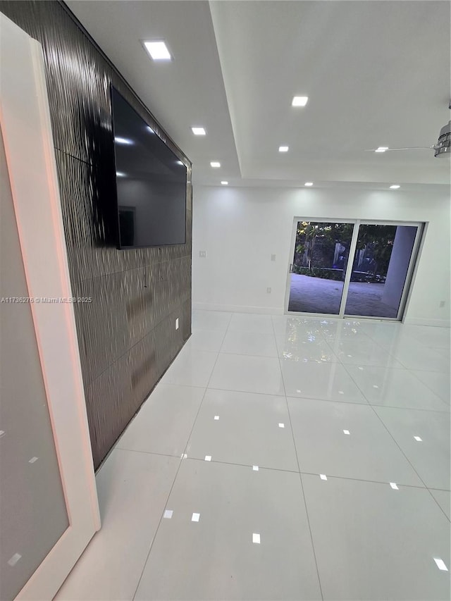 hallway with light tile patterned flooring