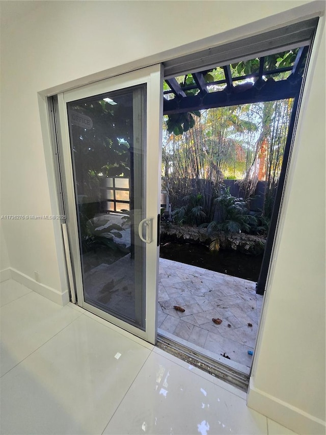 entryway featuring tile patterned flooring