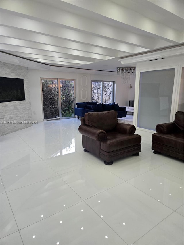 living room with light tile patterned flooring and beam ceiling