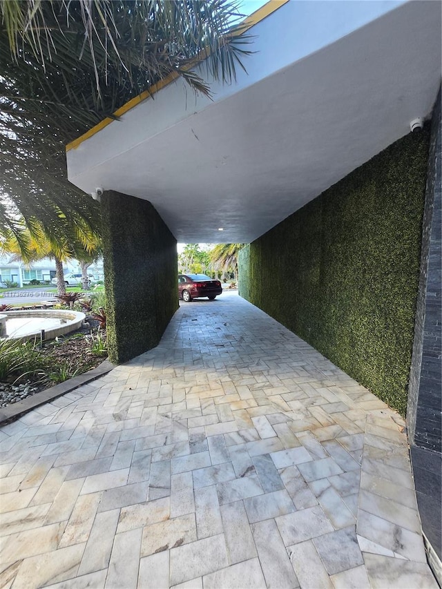 view of patio featuring a carport