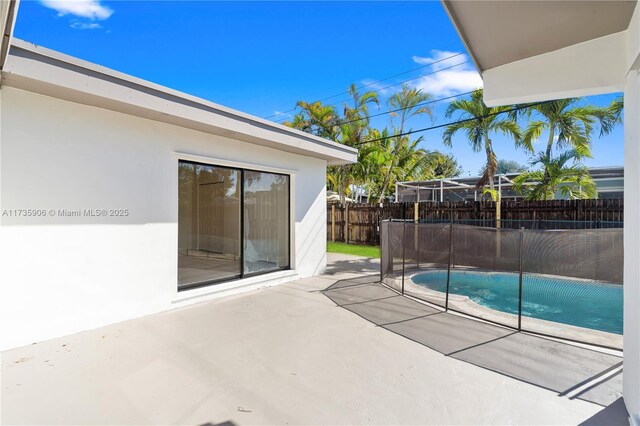 view of pool with a patio