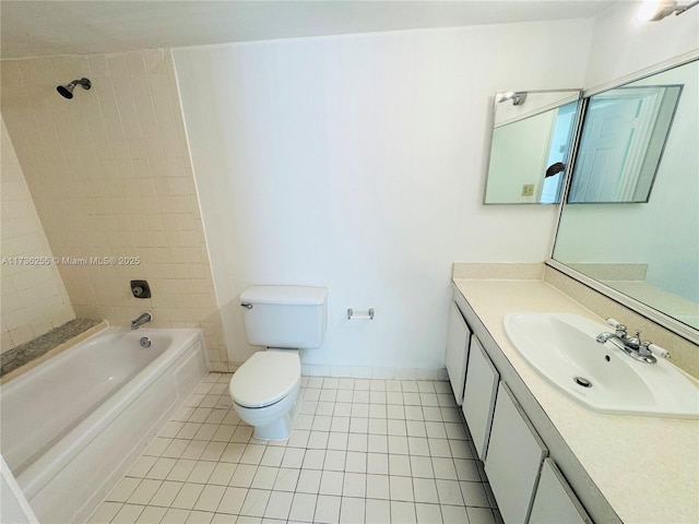 full bathroom with vanity, tile patterned flooring, tiled shower / bath combo, and toilet