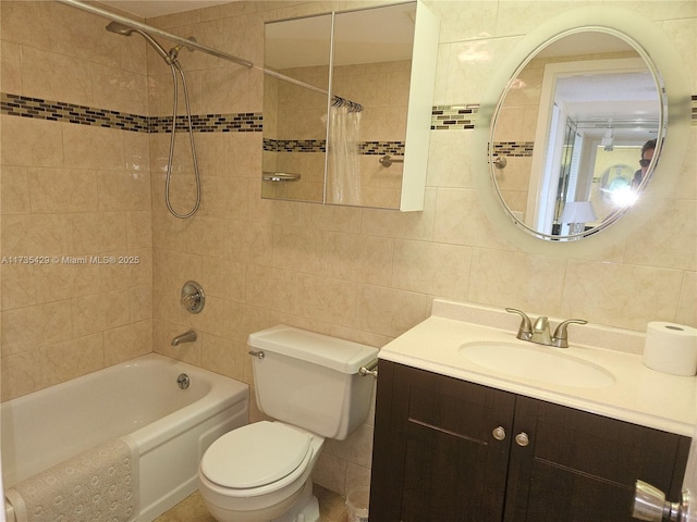 full bathroom with shower / tub combo with curtain, vanity, toilet, and tile walls