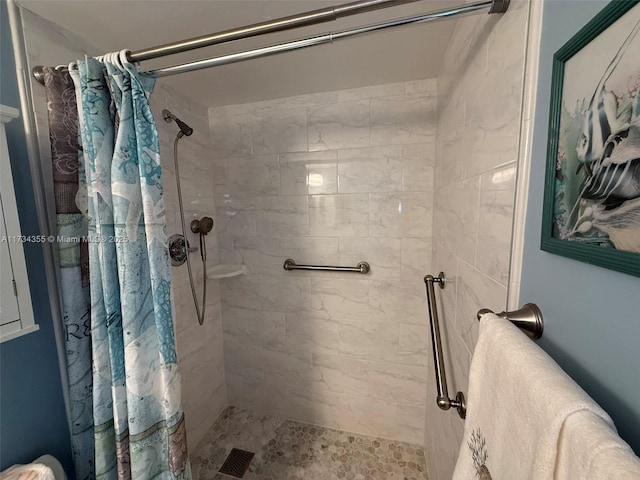 bathroom with a shower with curtain