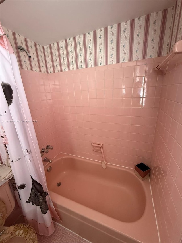 bathroom featuring shower / bath combination with curtain