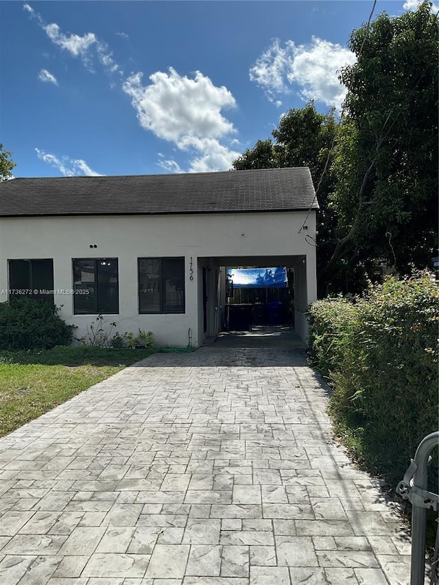 view of front of home with a garage