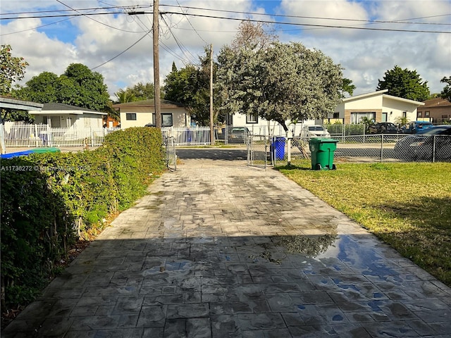 view of community with a lawn