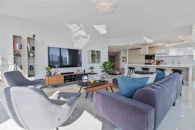 living room featuring light tile patterned flooring