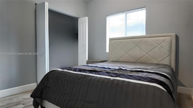 bedroom featuring light wood-type flooring