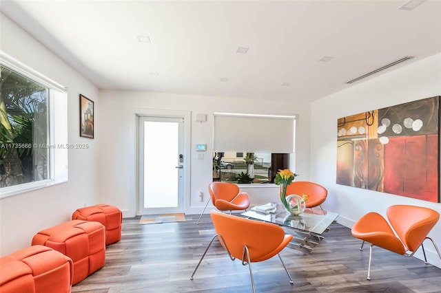 living area featuring hardwood / wood-style floors