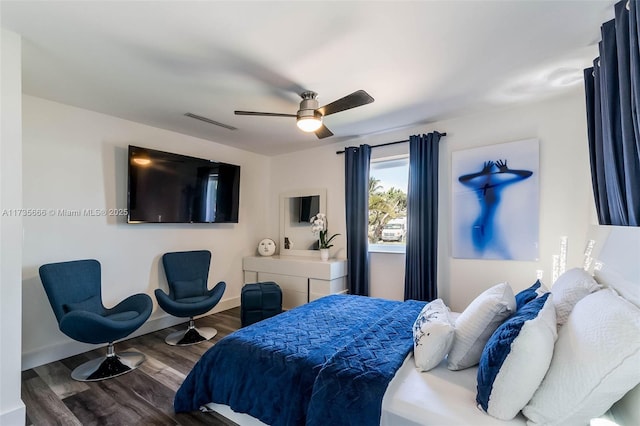 bedroom featuring hardwood / wood-style flooring and ceiling fan