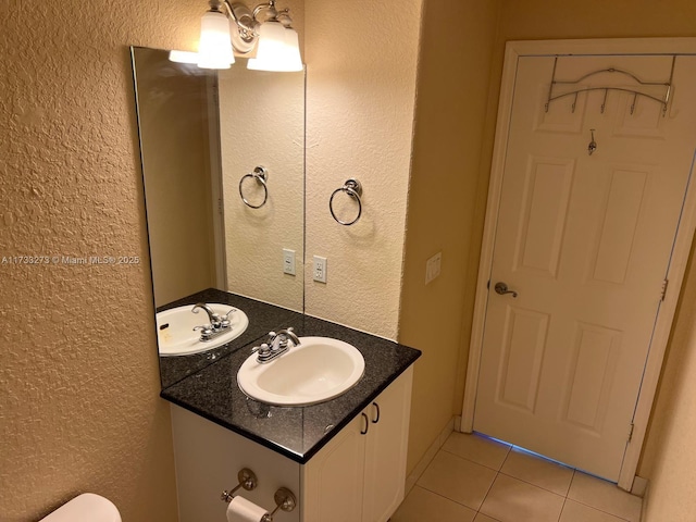 bathroom featuring vanity and tile patterned floors