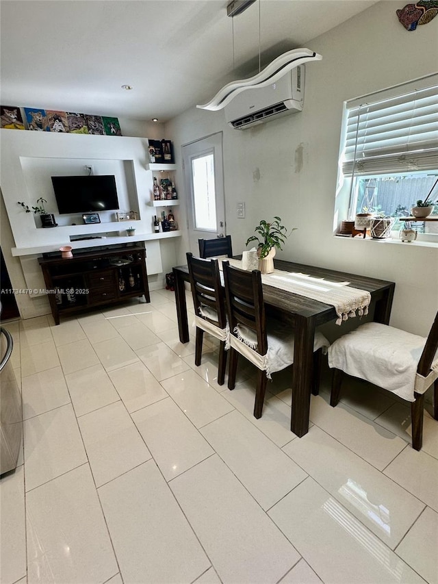 tiled dining room with a wall mounted air conditioner