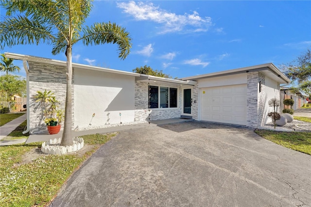 single story home featuring a garage