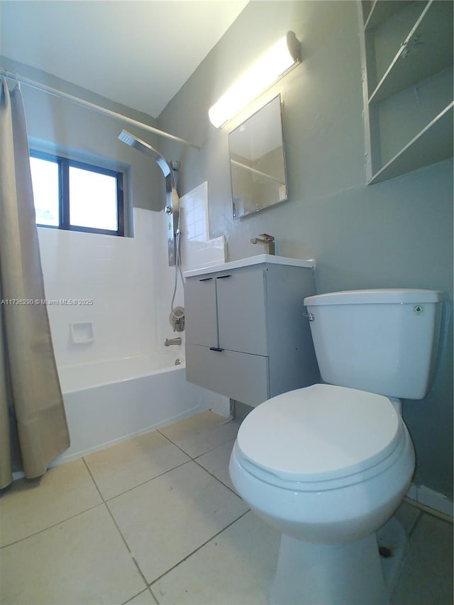 full bathroom with vanity, toilet, tile patterned flooring, and shower / bath combo