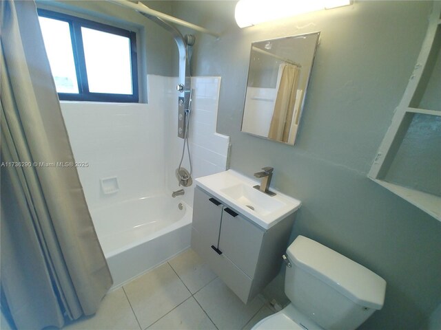 full bathroom with vanity, tile patterned flooring, toilet, and shower / bathtub combination with curtain