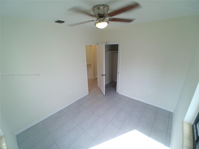 empty room featuring ceiling fan