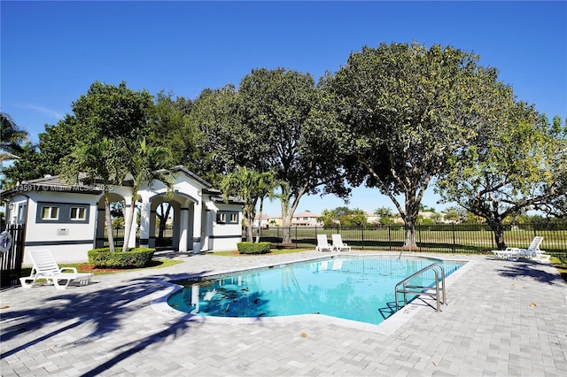 view of swimming pool featuring a patio