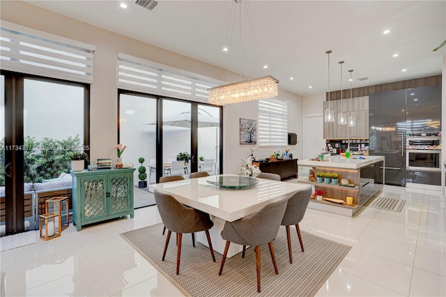 dining space featuring light tile patterned floors, visible vents, and recessed lighting