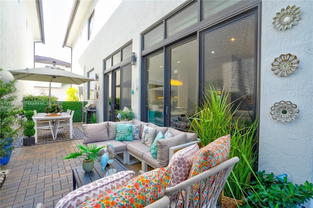 view of patio featuring an outdoor hangout area and outdoor dining space