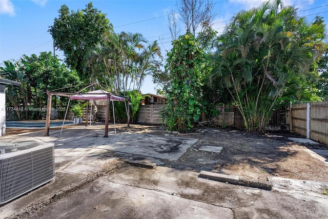 view of patio with a gazebo and cooling unit