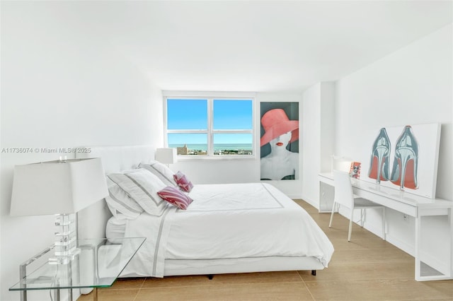 bedroom featuring hardwood / wood-style flooring