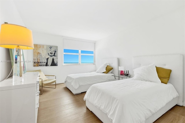 bedroom featuring hardwood / wood-style floors