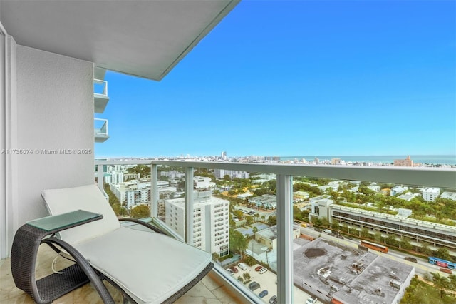 balcony featuring a water view